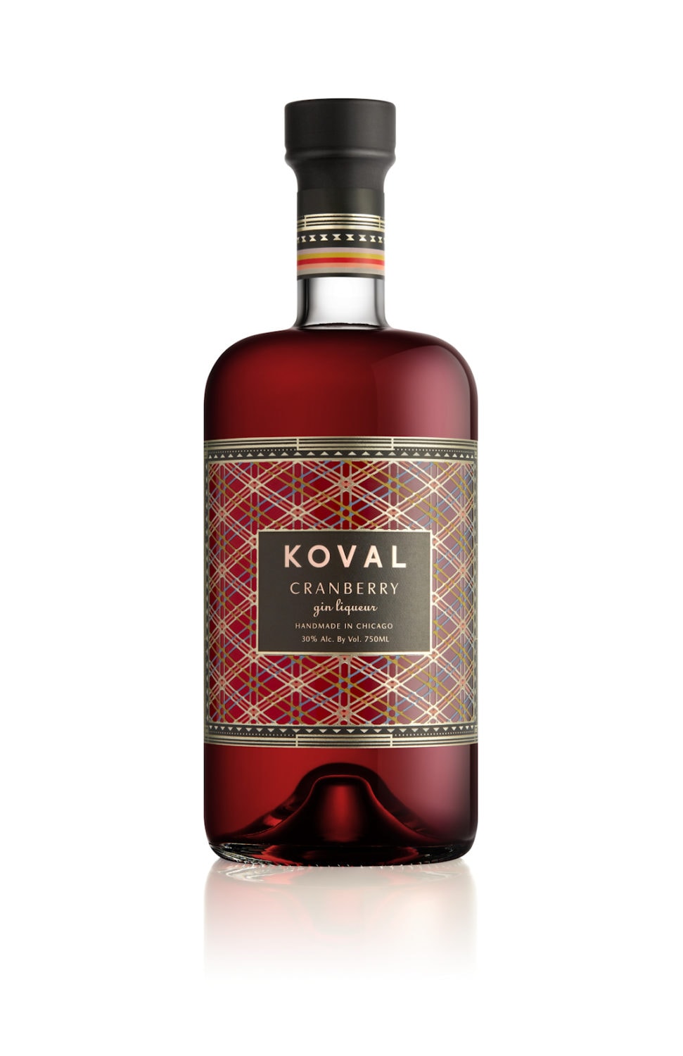 A bottle of KOVAL Distillery Cranberry Gin