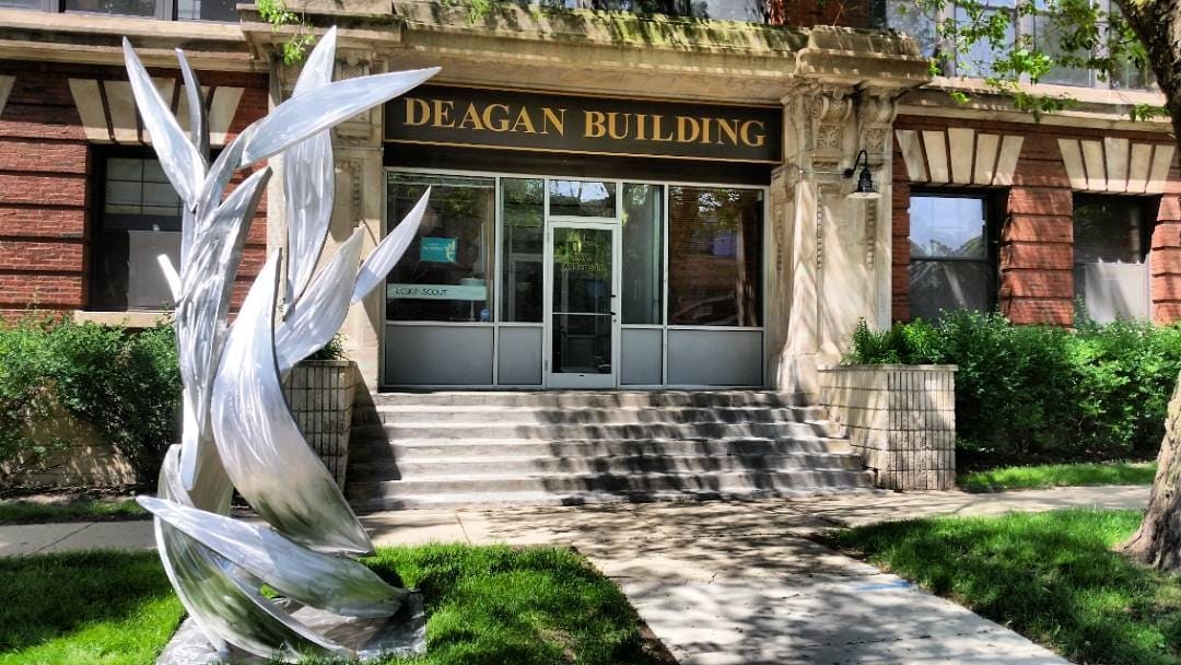 A sculpture in front of the historic Deagan Building in Ravenswood Ave