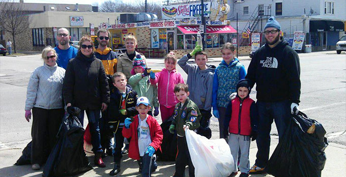 A group of Lincoln Square North Neighbors volunteers celebrate a fall cleanup in 2013